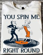 You-spin-me-right-round-Vinyl-record-lover-couple-dancing-on-vinyl.jpg