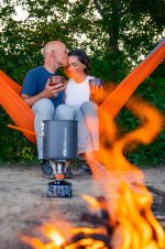 couple+kissing+in+hammock+coffee+fire.jpeg