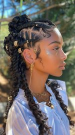 Unique Corn Creative Cornrows an Curls Q.jpg