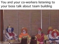 and-co-workers-listening-boss-talk-about-team-building.png